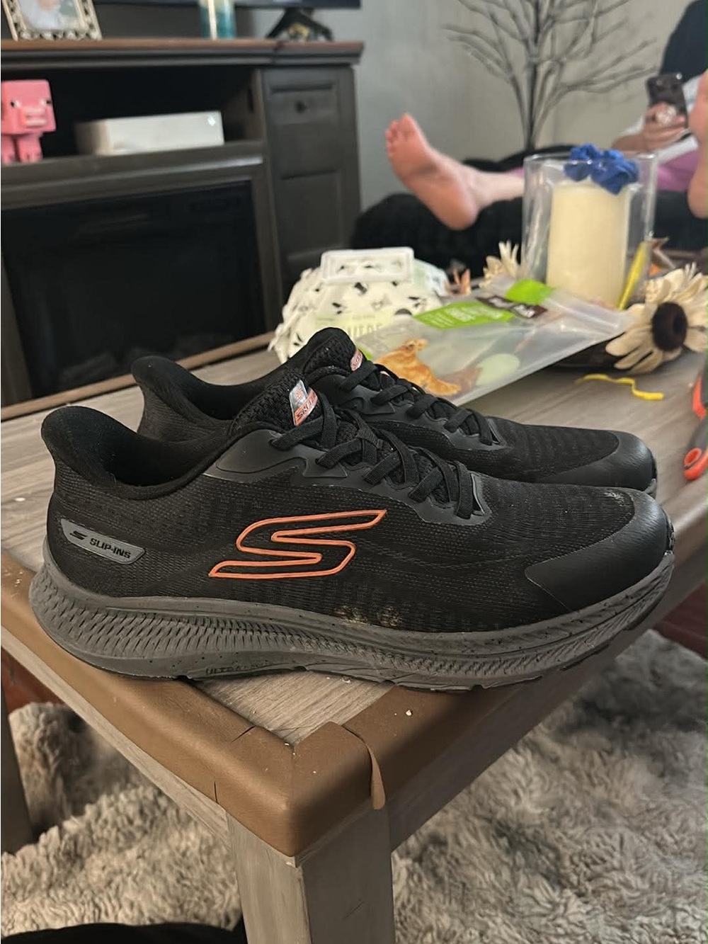 Skechers Women's Black Athletic Sneakers with Orange Logo Accent